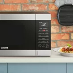 Galanz 1.2 Cu ft Air Fry + Sensor Cook Countertop Microwave Oven, 1000 Watts, Stainless Steel, New