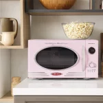 Nostalgia Retro 0.9 cu. ft. 800-Watt Countertop Microwave, Pink, New